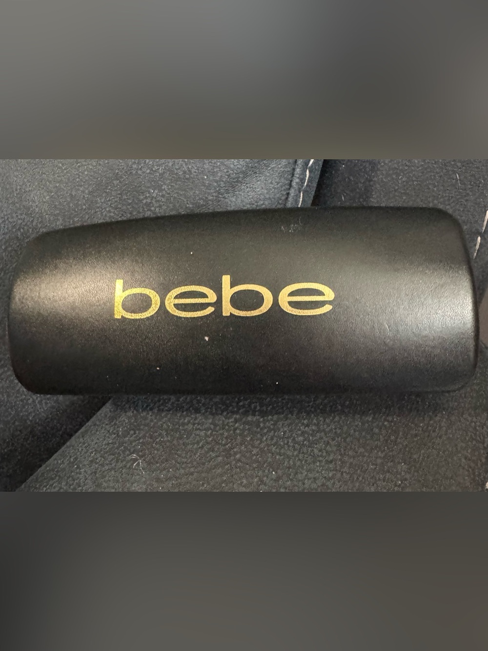 bebe Black and Gold Logo Slide